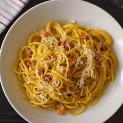 High calorie spaghetti carbonara pasta in a bowl