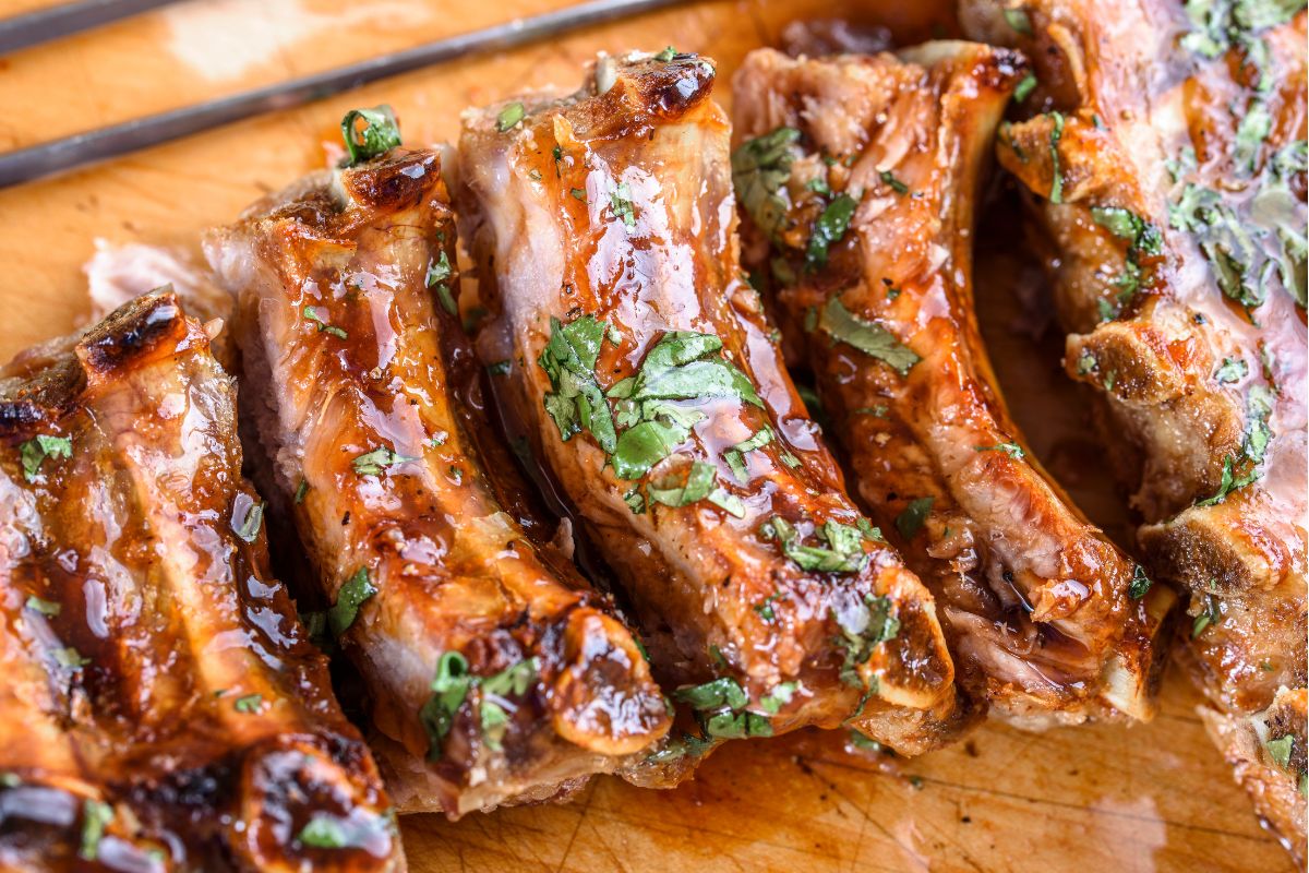 20 Highest Calorie Meats for Weight Gain 5 Pork ribs that have been glazed in bbq.