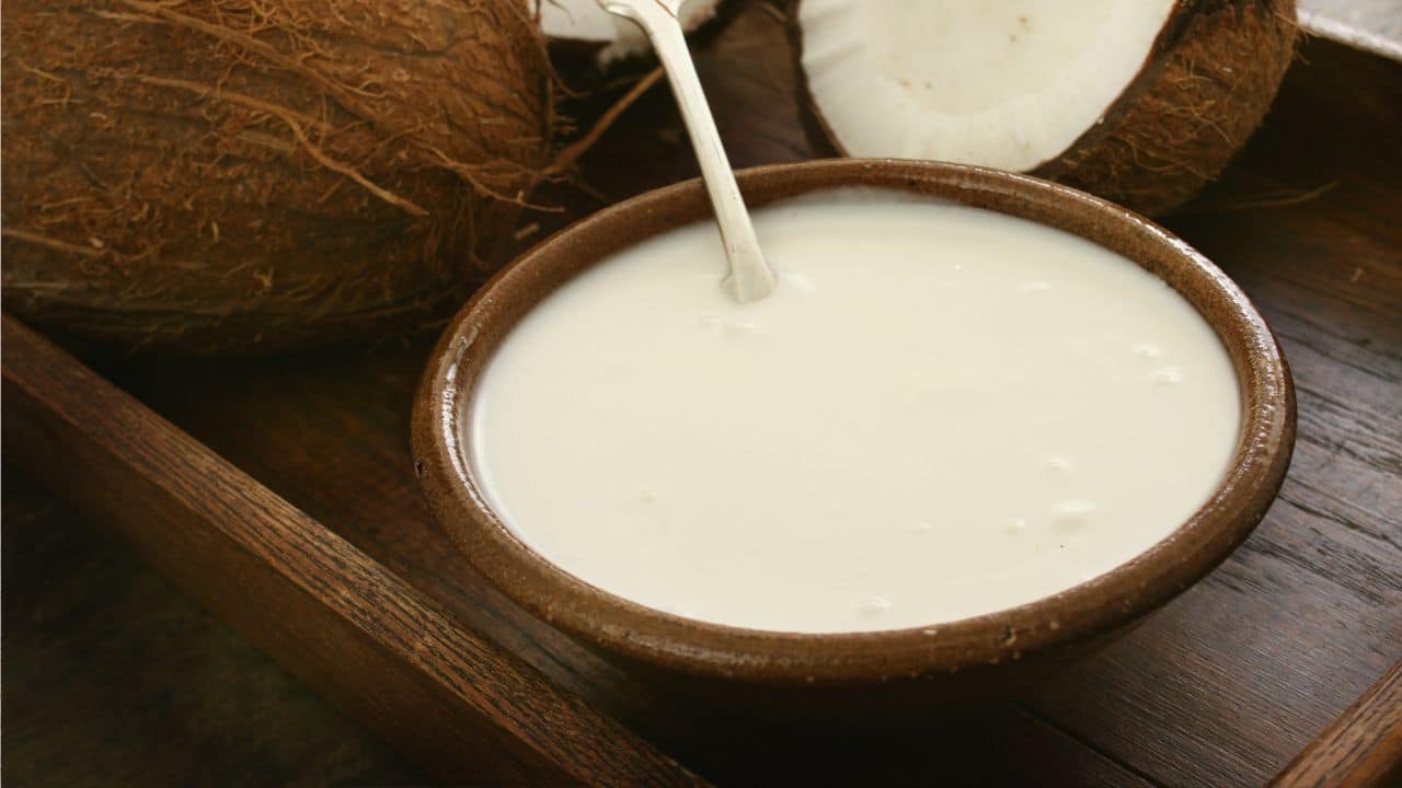10 Common Foods That Are Secretly High in Calories 3 Coconut milk in a bowl