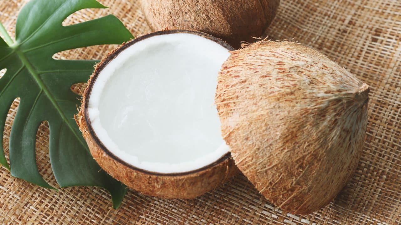 10 High-Calorie Foods To Avoid & 10 That Are Actually Healthy 12 Coconut cut in half